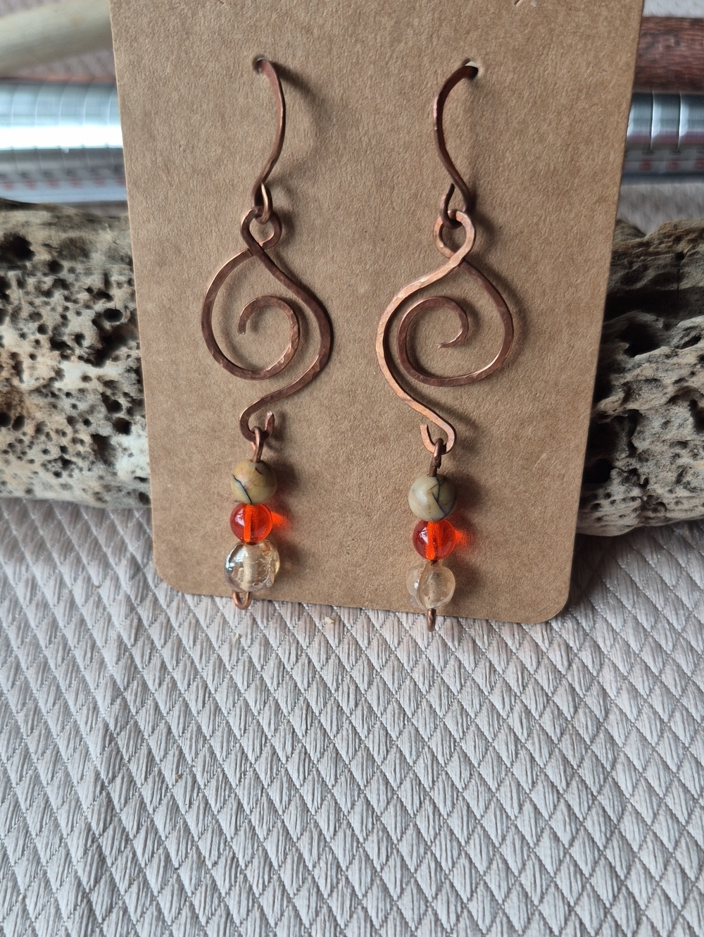 Artisan Copper Spiral Earrings with Orange and Cream Beads
